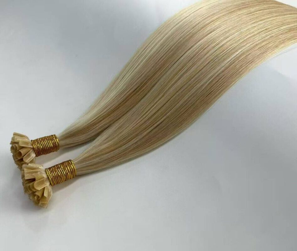 Cuticle-aligned human fusion hair extensions prepared by our B2B trading company for international salons.