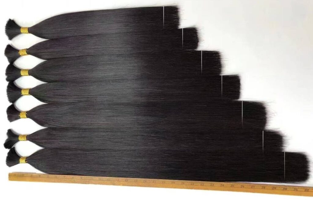 True to length measurement showing 18 to 30 inches of raw virgin human hair bulk