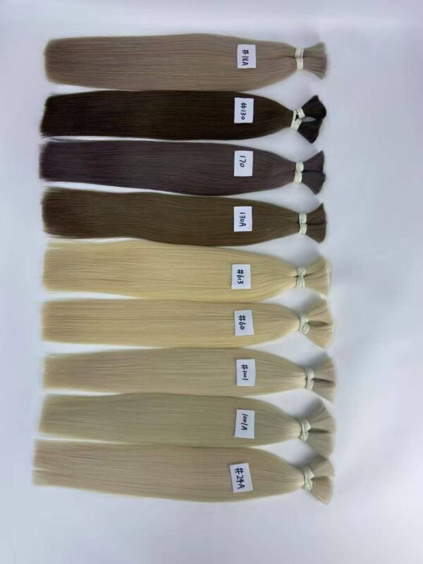 Top view of premium raw human hair bulk wholesale prepared by our B2B trading company for European salons.