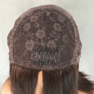 Inside cap construction of human hair silk top wigs featuring a closed mesh top, secure combs, and wefted back